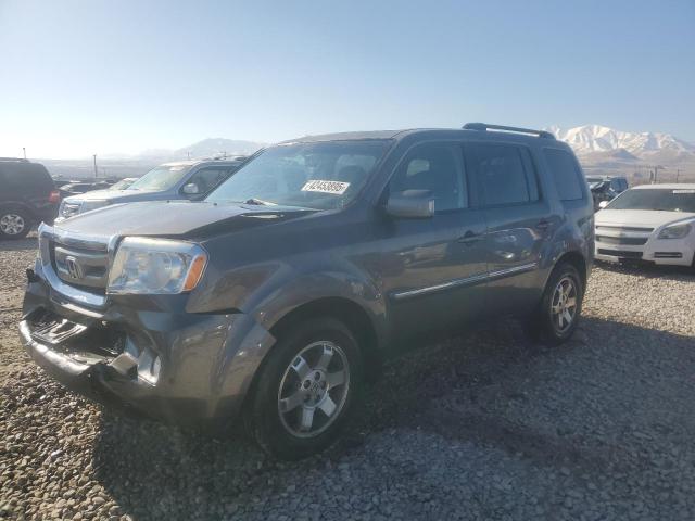 HONDA PILOT TOUR 2011 مع رقم تعريف المركبة 5FNYF4H94BB075493 - صورة من المزاد
