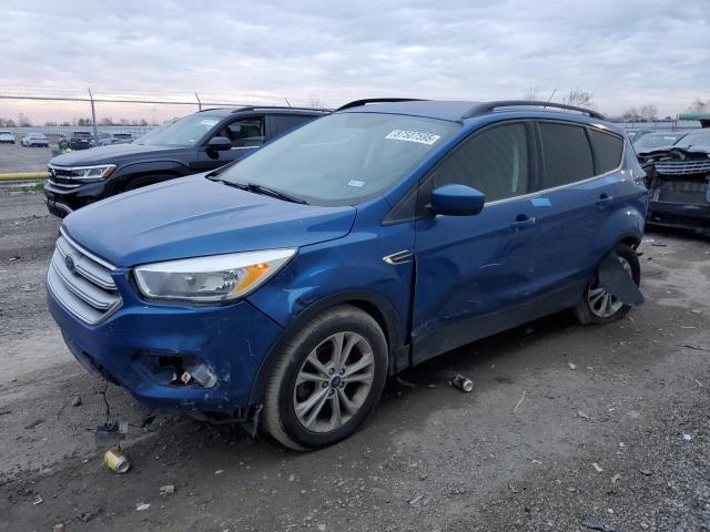 FORD ESCAPE SE 2018 with VIN 1FMCU0GD8JUC69556 - Photo from auction
