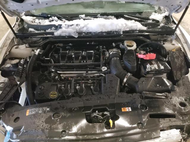 Photo 11 from auction – 2015 FORD TAURUS SEL with VIN 1FAHP2H86FG172124