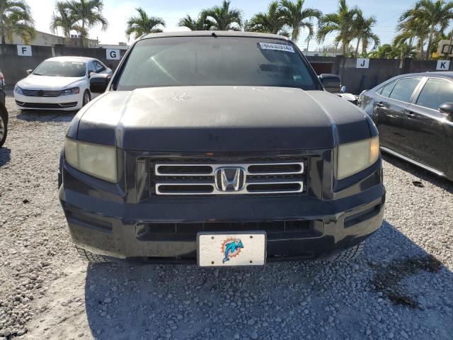 Photo 5 from auction – 2006 HONDA RIDGELINE with VIN 2HJYK16526H516320