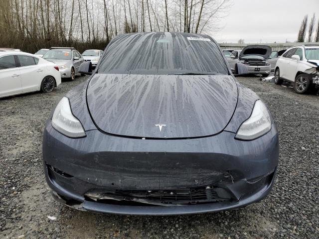 Photo 5 from auction – 2022 TESLA MODEL Y with VIN 7SAYGDEEXNA009128