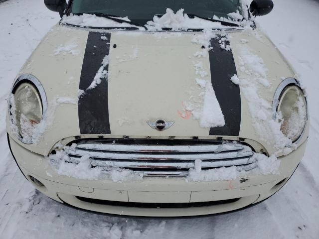 Photo 11 from auction – 2009 MINI COOPER CLU with VIN WMWML33529TX50669