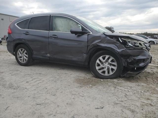 Photo 4 from auction – 2015 HONDA CR-V EXL with VIN 2HKRM4H78FH666992