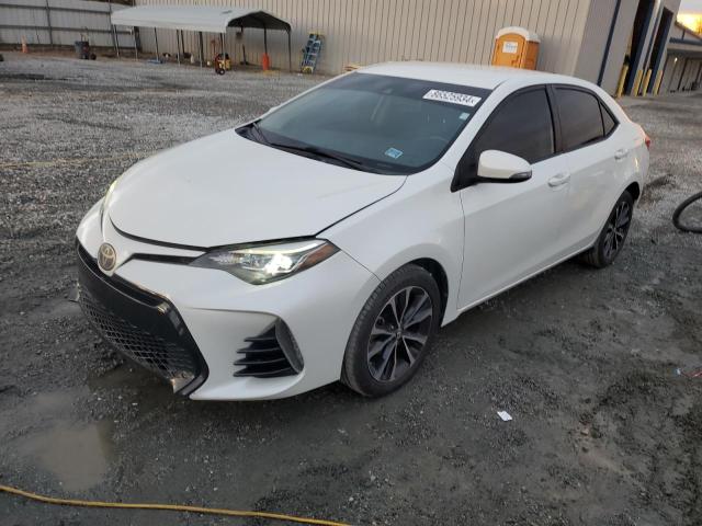 TOYOTA COROLLA L 2017 with VIN 5YFBURHE7HP615261 - Photo from auction