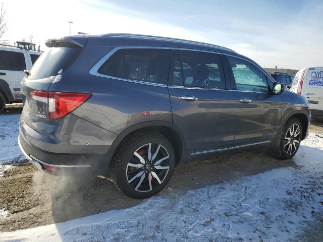 Photo 3 from auction – 2022 HONDA PILOT ELIT with VIN 5FNYF6H04NB044391