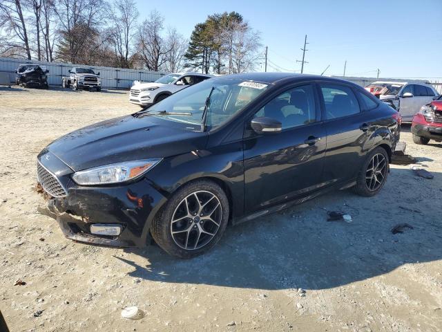 FORD FOCUS SE 2015 with VIN 1FADP3F21FL311991 - Photo from auction