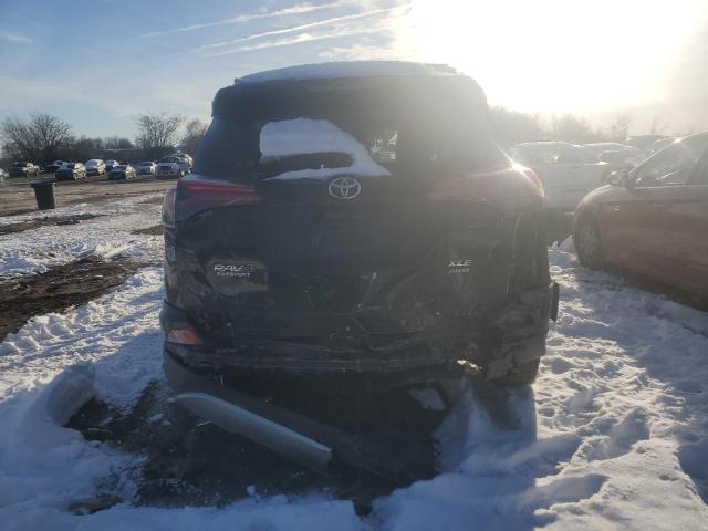 Photo 6 from auction – 2017 TOYOTA RAV4 XLE with VIN JTMRFREVXHJ707157