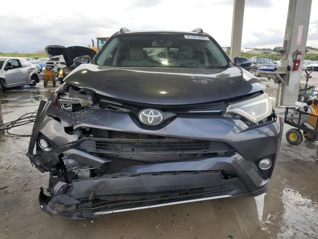 Photo 5 from auction – 2017 TOYOTA RAV4 LIMIT with VIN JTMYFREV6HJ144667