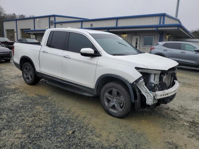 Photo 4 from auction – 2023 HONDA RIDGELINE with VIN 5FPYK3F74PB007779
