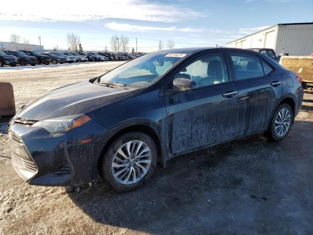TOYOTA COROLLA L 2018 with VIN 2T1BURHE5JC092151 - Photo from auction