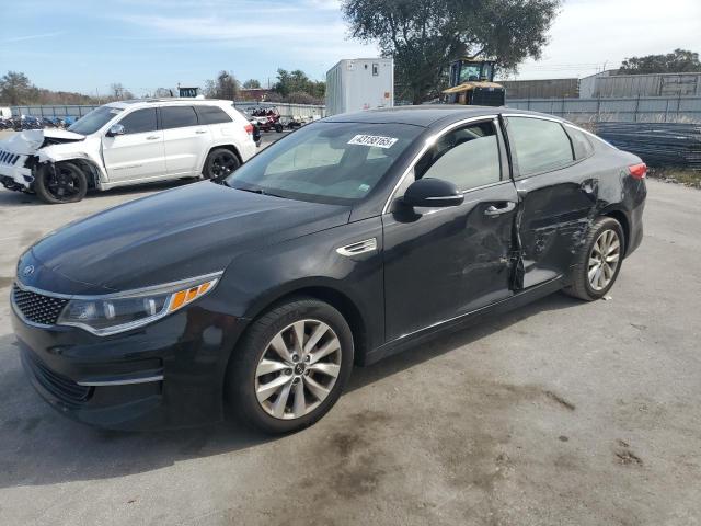 KIA OPTIMA EX 2016 with VIN 5XXGU4L31GG102240 - Photo from auction