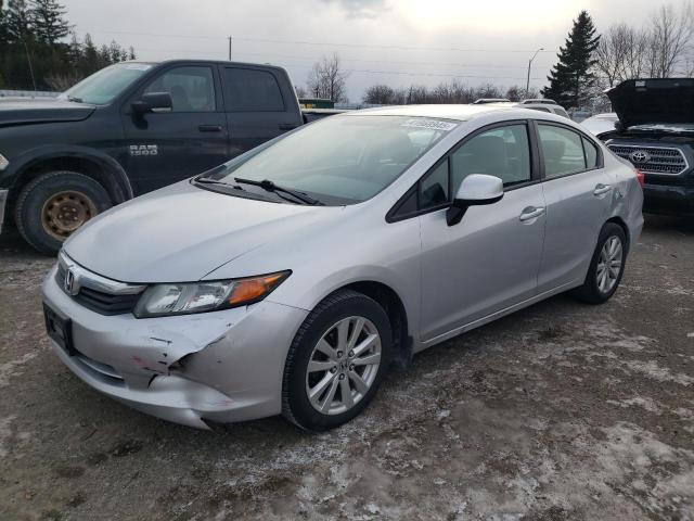 HONDA CIVIC LX 2012 with VIN 2HGFB2F4XCH035253 - Photo from auction