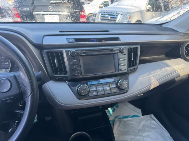 Photo 9 from auction – 2015 TOYOTA RAV4 XLE with VIN 2T3RFREV6FW299058