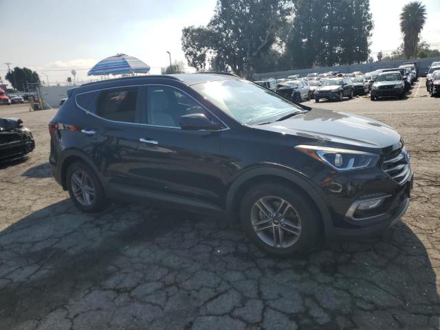 Photo 4 from auction – 2017 HYUNDAI SANTA FE S with VIN 5NMZU3LB0HH025762