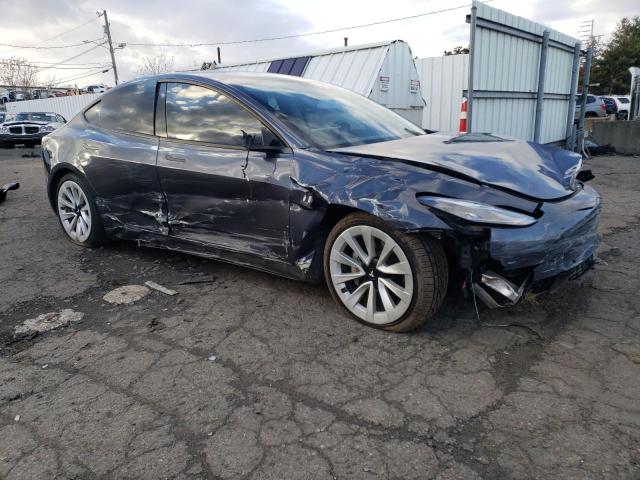 Photo 4 from auction – 2022 TESLA MODEL 3 with VIN 5YJ3E1EB3NF288944
