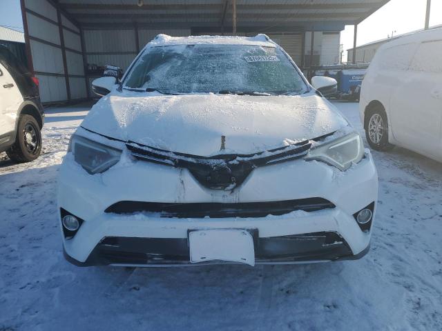 Photo 5 from auction – 2017 TOYOTA RAV4 HV LE with VIN JTMRJREV4HD152011