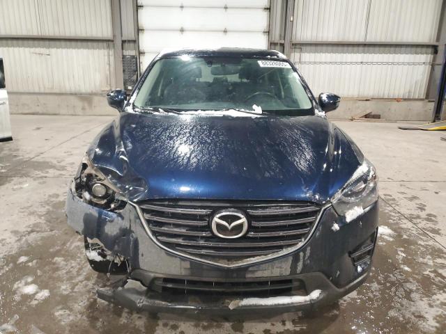 Photo 5 from auction – 2016 MAZDA CX-5 GT with VIN JM3KE4DY9G0678037