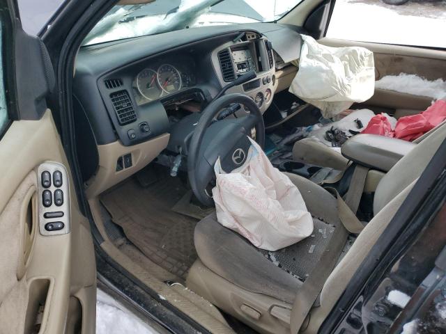 Photo 8 from auction – 2003 MAZDA TRIBUTE LX with VIN 4F2CZ94143KM32108