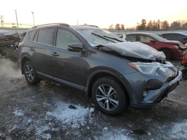 Photo 4 from auction – 2017 TOYOTA RAV4 XLE with VIN JTMRFREV2HJ161423