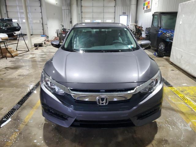 Photo 5 from auction – 2017 HONDA CIVIC LX with VIN 2HGFC2F57HH556119