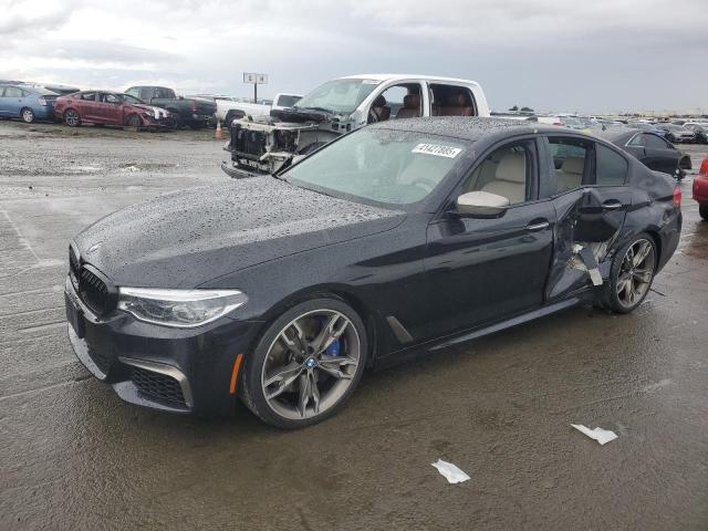 BMW M550XI 2018 with VIN WBAJB9C56JB049250 - Photo from auction