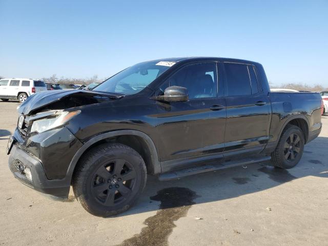 HONDA RIDGELINE 2017 with VIN 5FPYK3F84HB001149 - Photo from auction