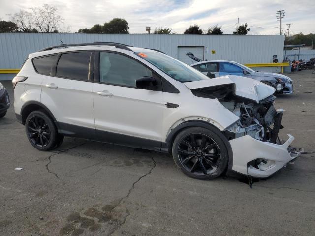 Photo 4 from auction – 2018 FORD ESCAPE SE with VIN 1FMCU9GDXJUA92173