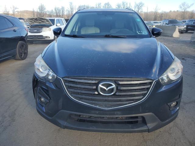 Photo 5 from auction – 2016 MAZDA CX-5 TOURI with VIN JM3KE2CY5G0857469