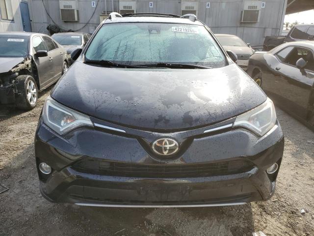 Photo 5 from auction – 2017 TOYOTA RAV4 XLE with VIN 2T3WFREV5HW369624