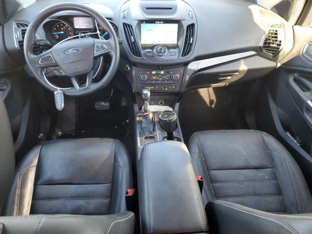 Photo 8 from auction – 2018 FORD ESCAPE TIT with VIN 1FMCU9J98JUC19121