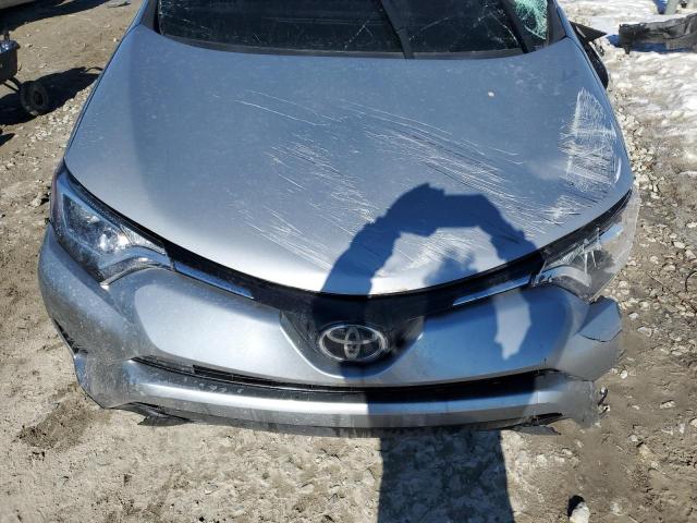 Photo 12 from auction – 2018 TOYOTA RAV4 LE with VIN 2T3BFREV6JW753979