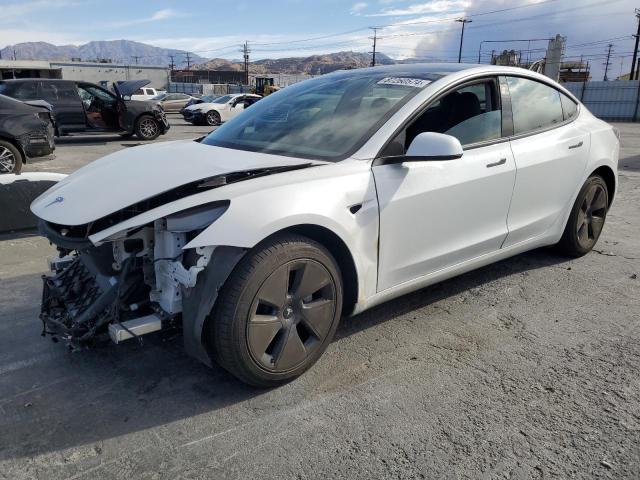 TESLA MODEL 3 2021 с VIN 5YJ3E1EA4MF867804 - Снимка от търг