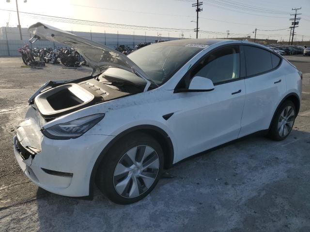 TESLA MODEL Y 2023 с VIN 7SAYGDEE2PA063039 - Фото с аукциона