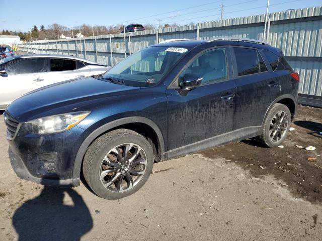 MAZDA CX-5 GT 2016 with VIN JM3KE4DY8G0805912 - Photo from auction
