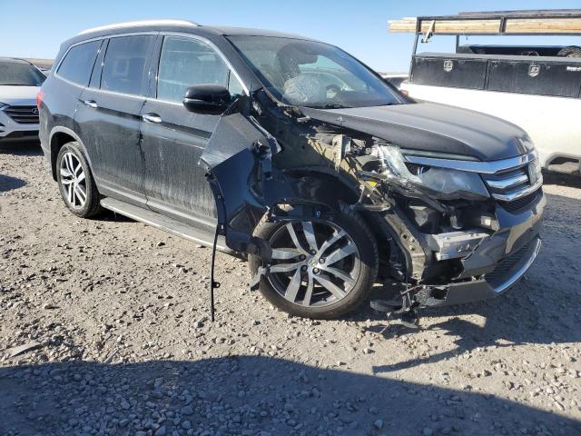 Photo 4 from auction – 2017 HONDA PILOT ELIT with VIN 5FNYF6H09HB030751