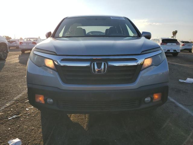 Photo 5 from auction – 2017 HONDA RIDGELINE with VIN 5FPYK2F57HB011450