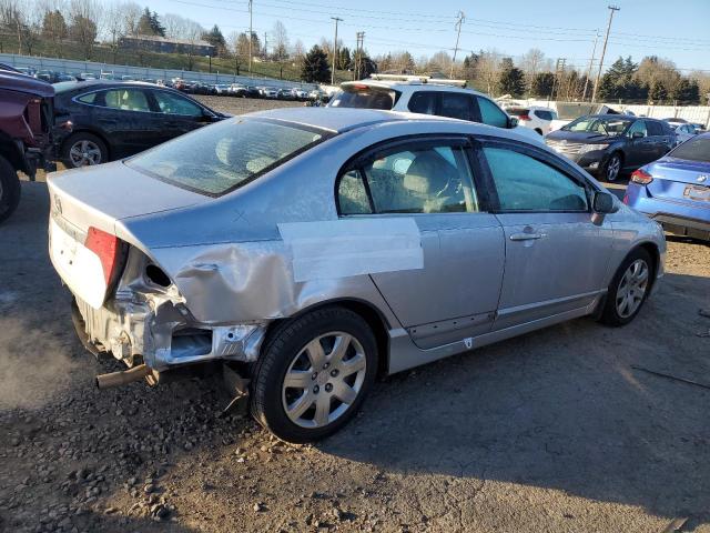 Photo 3 from auction – 2011 HONDA CIVIC LX with VIN 19XFA1F54BE022738