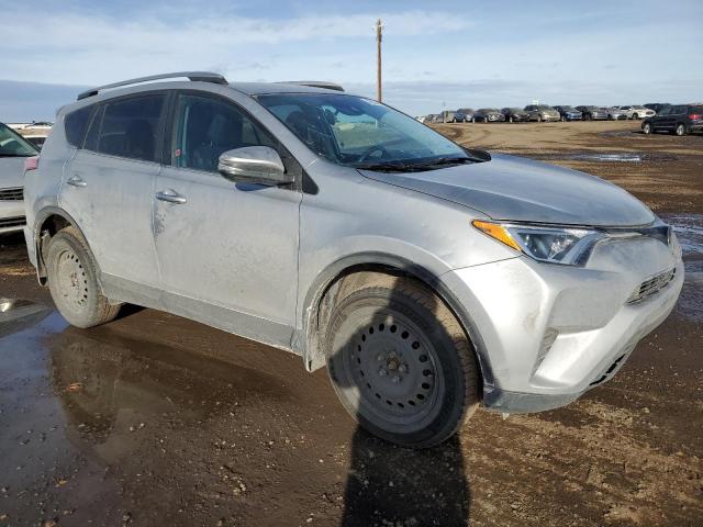 Photo 4 from auction – 2018 TOYOTA RAV4 LE with VIN 2T3BFREV5JW829207