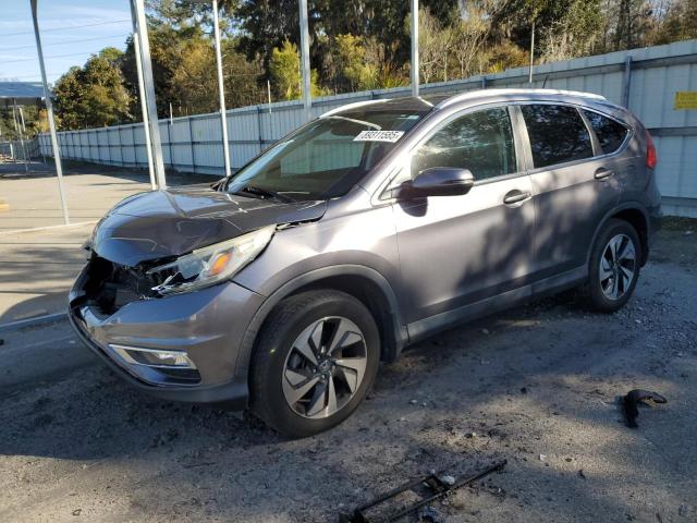 HONDA CR-V TOURI 2016 with VIN 5J6RM3H97GL009488 - Photo from auction