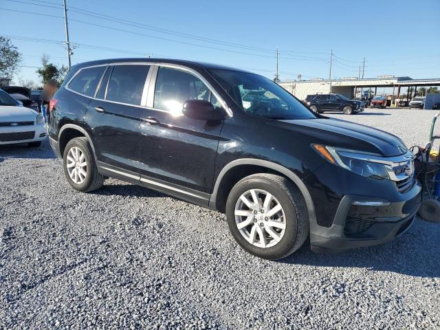 Photo 4 from auction – 2021 HONDA PILOT LX with VIN 5FNYF5H10MB007209