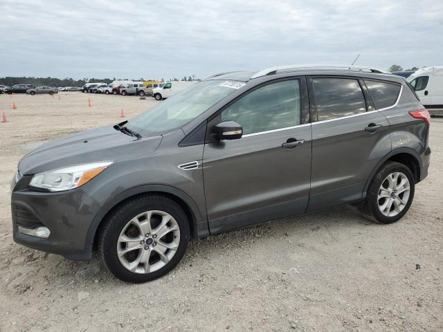 FORD ESCAPE TIT 2016 with VIN 1FMCU9JX4GUA34393 - Photo from auction