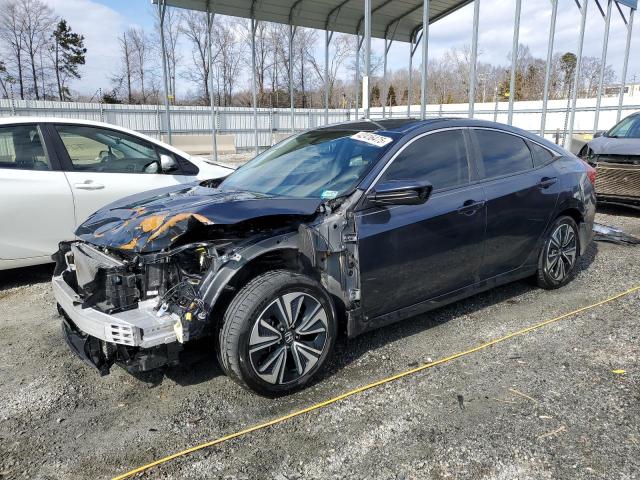 HONDA CIVIC EXL 2018 with VIN JHMFC1F73JX033920 - Photo from auction