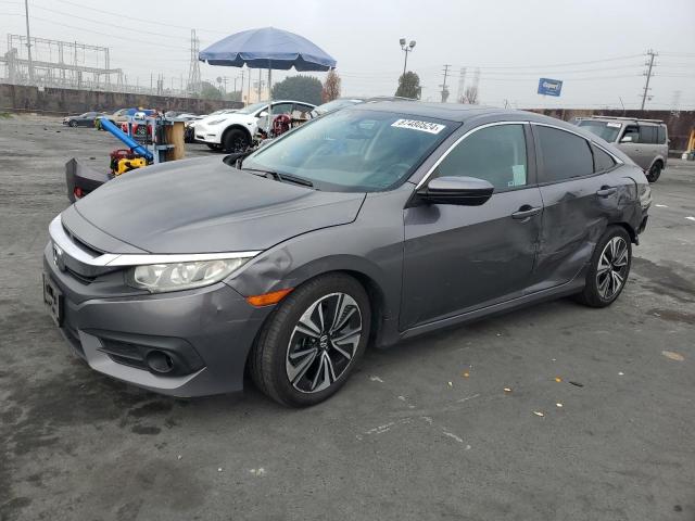 Photo 1 from auction – 2017 HONDA CIVIC EXL with VIN 2HGFC1F76HH656675