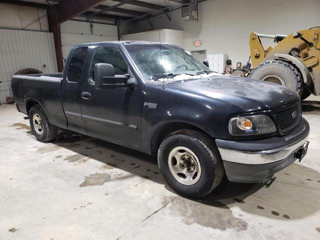 Zdjęcie 4 z aukcji – 2002 FORD F150 z VIN 1FTRX17282NA03377