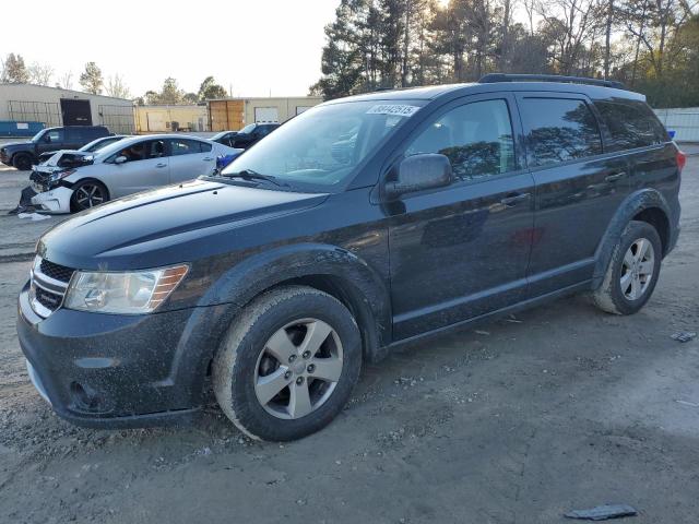 DODGE JOURNEY SX 2012 with VIN 3C4PDDBG1CT171044 - Photo from auction