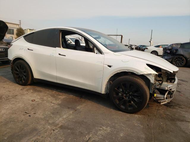 Снимка 4 от търг – 2023 TESLA MODEL Y с VIN 7SAYGAEE1PF620153