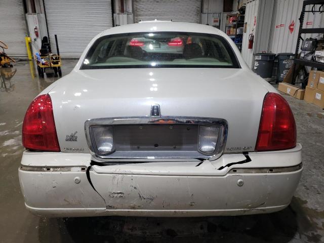 Photo 6 from auction – 2004 LINCOLN TOWN CAR U with VIN 1LNHM83W04Y649628
