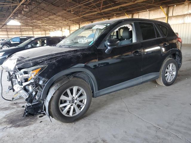 MAZDA CX-5 TOURI 2016 with VIN JM3KE2CY0G0723954 - Photo from auction