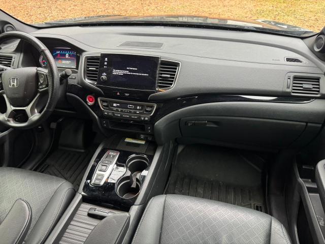 Photo 9 from auction – 2021 HONDA PASSPORT E with VIN 5FNYF8H07MB016305