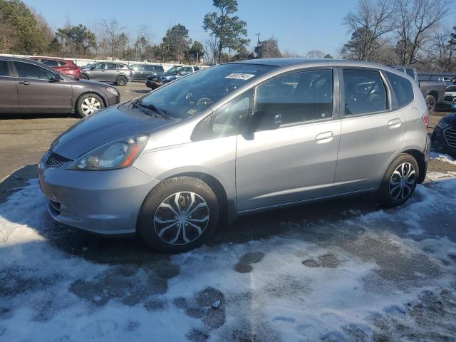 HONDA FIT 2010 with VIN JHMGE8H25AC023048 - Photo from auction